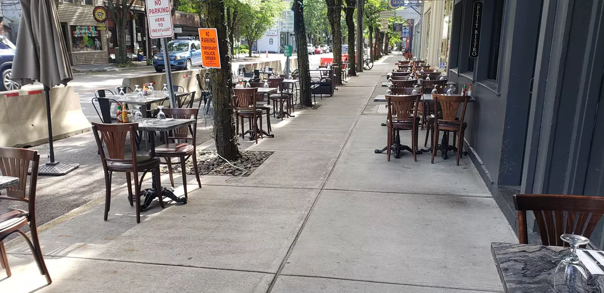 Expanded sidewalk seating outside Le Petit Bistro in Rhinebeck.