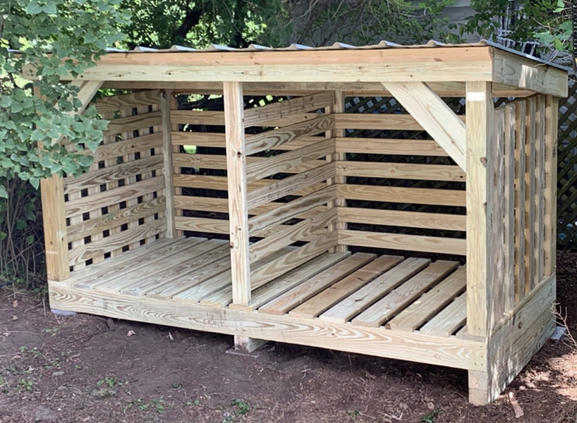 A firewood shed designed and built by Glenn's Sheds