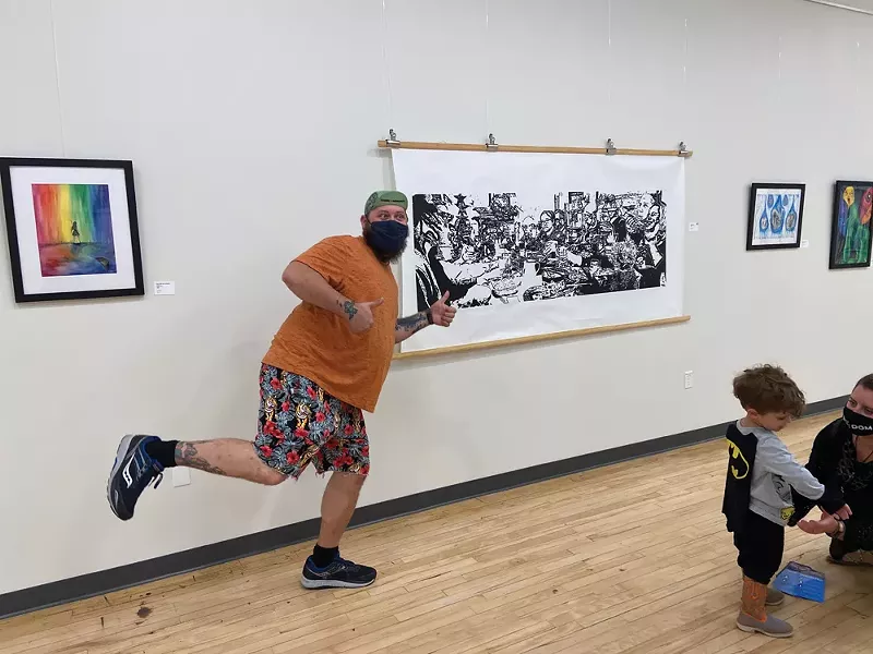 Justin Windman-Kerr with his piece Tryptophan, - part of “We’re All Human” on view at CCAC - through November 30.