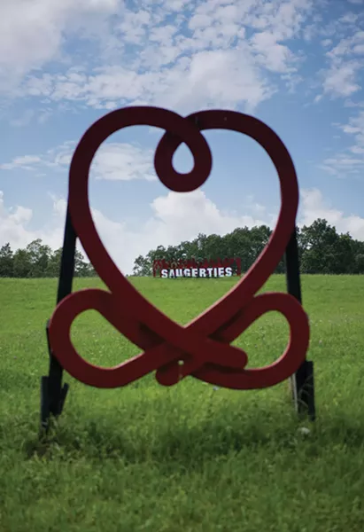 Love Knot sculpture by Ze'ev Willy Neumann and sign leading into Saugerties - CHRISTINE ASHBURN