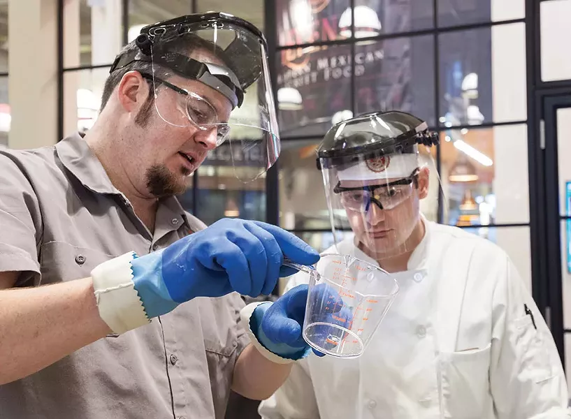 Brewmaster Hutch Kugeman making beer with students
