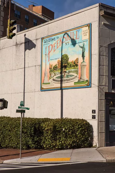 A vintage postcard sign celebrating the city's Depew Park. - PAMELA PASCO