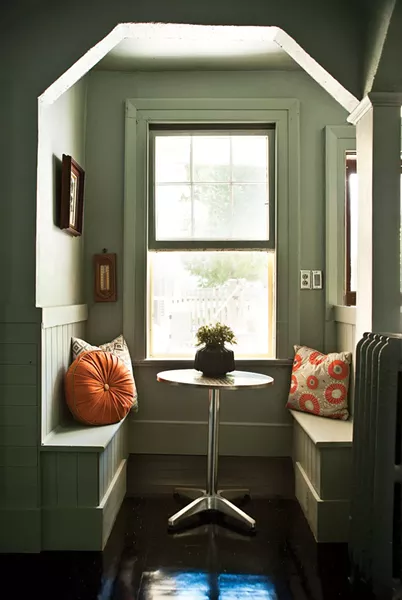 The home's breakfast nook. "I've gone through so many cans of paint in this house," Sexton says. "I painted one color, lived with it for a while, then painted it again. It's a creative process." - DEBORAH DEGRAFFENREID