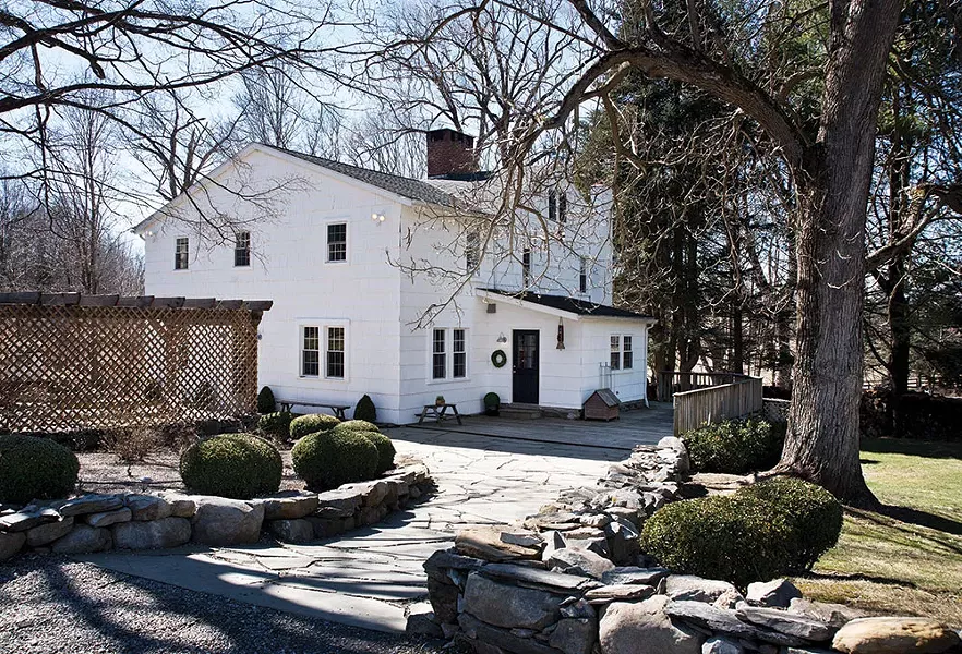 The 18th-century refurbished farmhouse sits on almost 80 acres of land—room enough for her family of six and her Alpacas to roam - DEBORAH DEGRAFFENREID