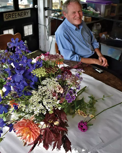Tim Steinhoff with some of his favorite cut flowers. - LARRY DECKER
