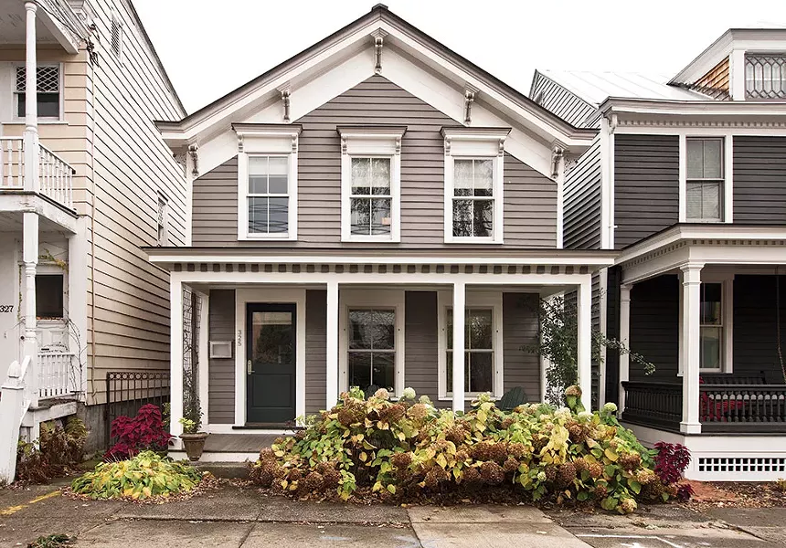 Smith restored the facade of the Greek Revival cottage with an eye for historic detail. What couldn’t be salvaged from the original design was carefully recreated. - DEBORAH DEGRAFFENREID