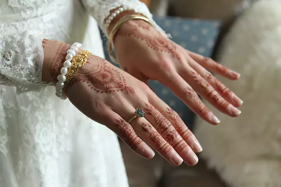 Marie Doyon displays her custom engagement ring by Hudson Valley Goldsmith.