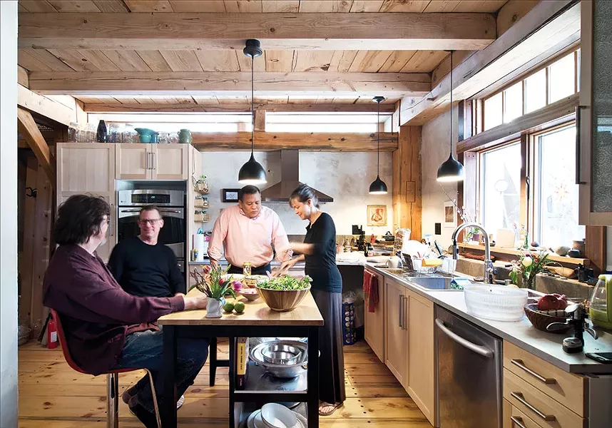 The home’s south-facing kitchen is aligned perfectly with the solstice—the sun rises in the kitchen window at 6am each June 21st. - DEBORAH DEGRAFFENREID