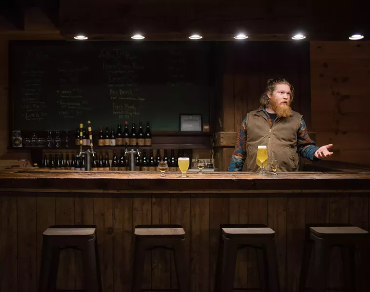 Evan Watson in the new Plan Bee taproom. - DEREK DELLINGER
