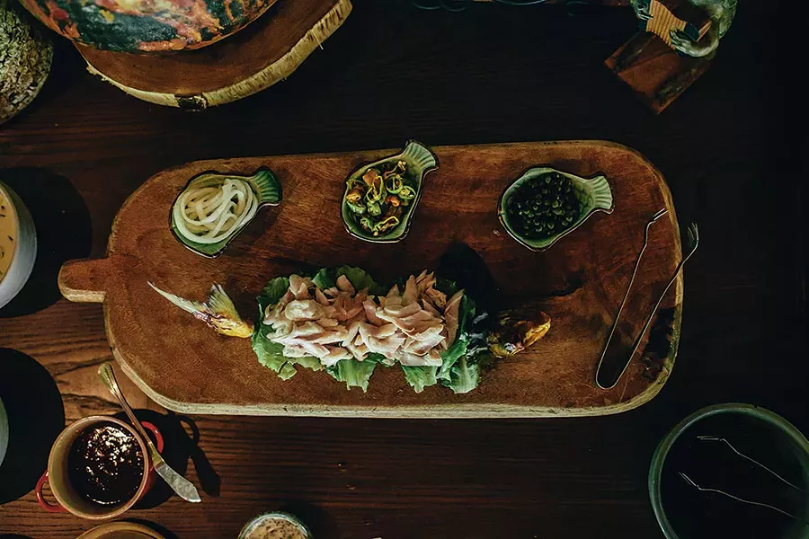 House-smoked trout served with pickled onions, pickled shishito peppers and capers.