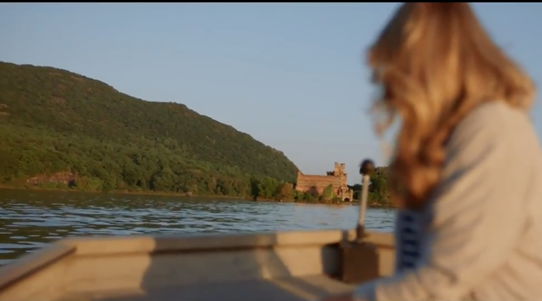 A still from a recent Chase Sapphire ad, starring Jillian Fisher and Bannerman Castle.