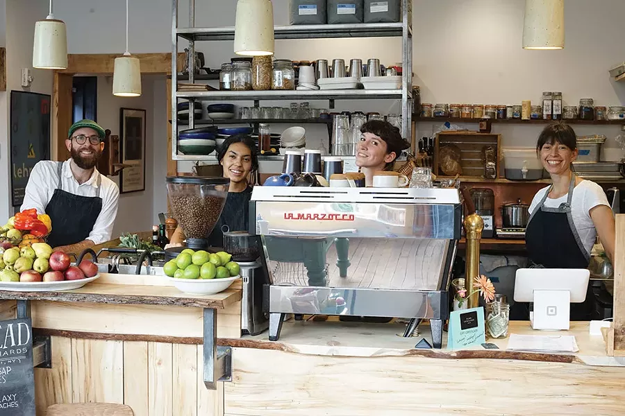 Mark Palmer, Nicole Rojas, Molly Hamilton, and Anth Palmer at Village Coffee and Goods. - JOHN GARAY