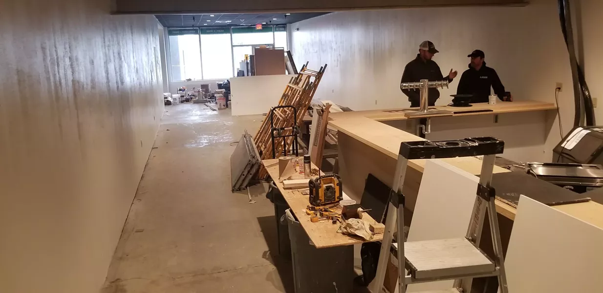 The bar and lobby under construction.