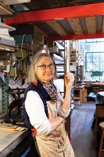 Alice Vaughan, Bookbinder - “There’s a different kind of glass ceiling in craft,” says Alice Vaughan of Hudson River Bindery. “Craft requires x number of hours to do something and you can’t make it go faster.” The day we spoke, Vaughan had on her workbench an artist’s book from the 1700s that she would spend countless hours taking apart and reassembling. The next book up after that is a dog-chewed copy of the Big Book, the basic text for AA. “I work on everything that comes through my door, from the sublime to the ridiculous,” Vaughan says.