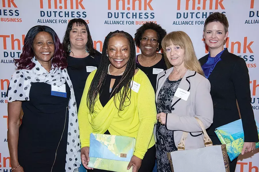 CEO Kelly Lyndgaard (right) with members of the Unshattered team after winning “Best Nonprofit of the Year” at the Think Dutchess awards in November. - UNSHATTERED