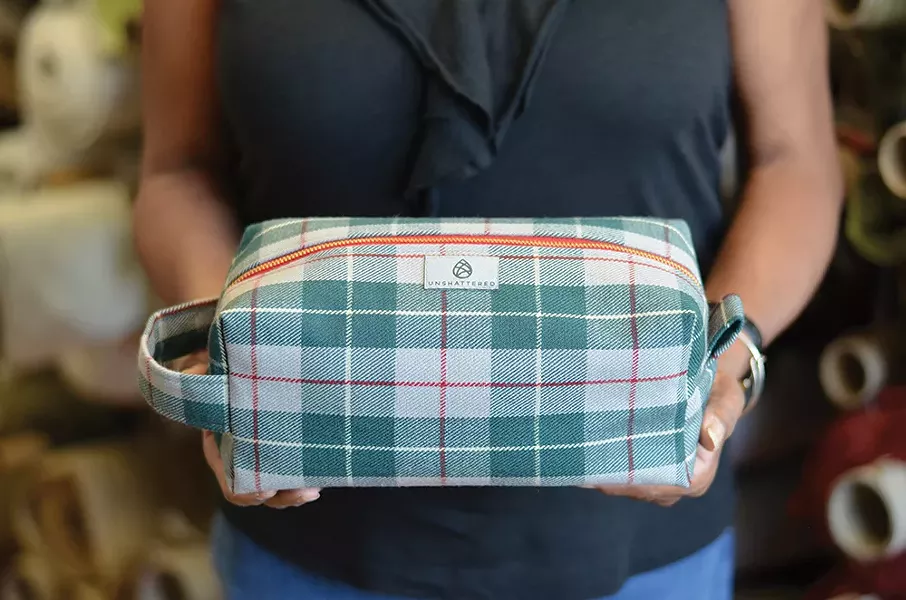 A toiletry kit made from 1955 Mercedes Benz upholstery.