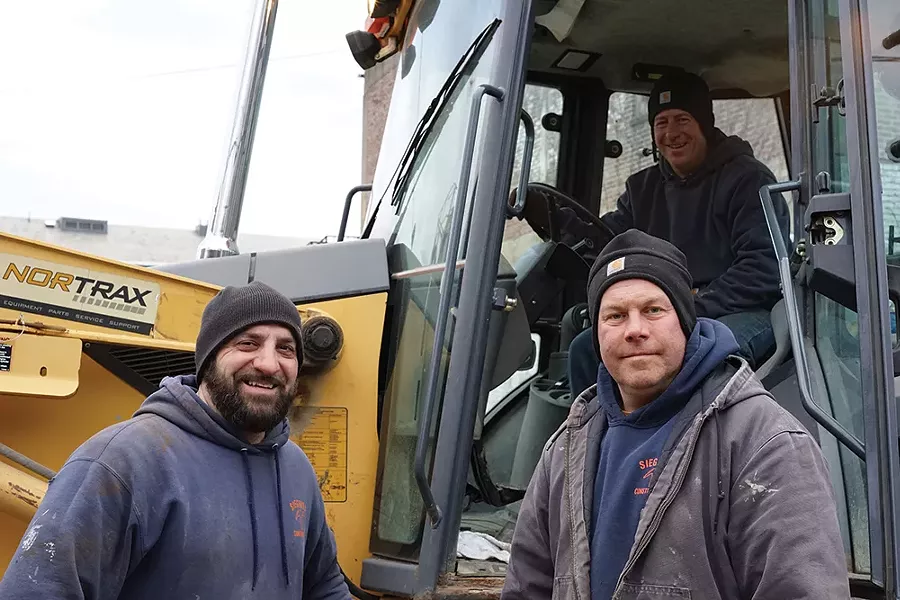 Angelo, Anthony, and Jimmy of Siegrist Construction working at the Mid-Hudson Heritage Center on Main Street. - PHOTO BY JOHN GARAY
