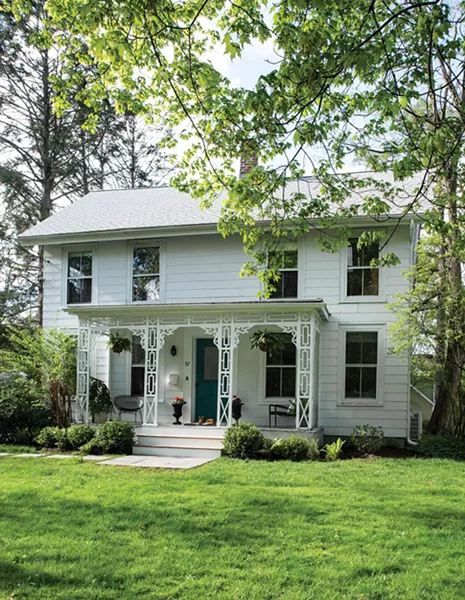 Walker’s 1870 Victorian is located in the Rhinebeck’s historic district. After removing - the exterior shingles, the family plans to paint the exterior walls and trim. “I think the house is going to tell me what color it wants to be when we remove the shingles,” Walker explains. “I don’t think it wants to be a dark color. I think it will be a lighter color and the - sashes and trims want to be dark.” The teal blue door is a shade Walker employs often in her designs. - PHOTO: DEBORAH DEGRAFFENREID