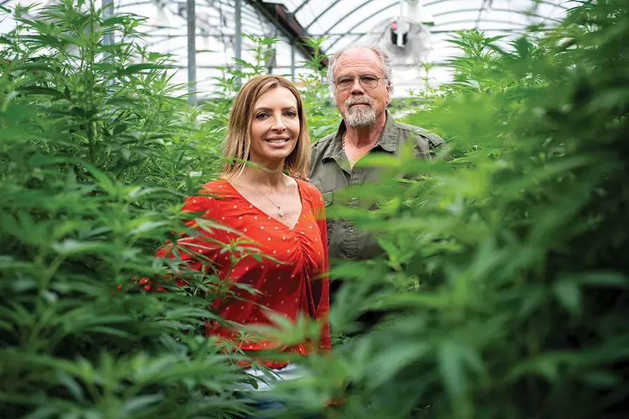 Michele Szymanski and Ed McCauley of Fusion CBD at their Warwick greenhouse. - PHOTO: CHRISTINE ASHBURN