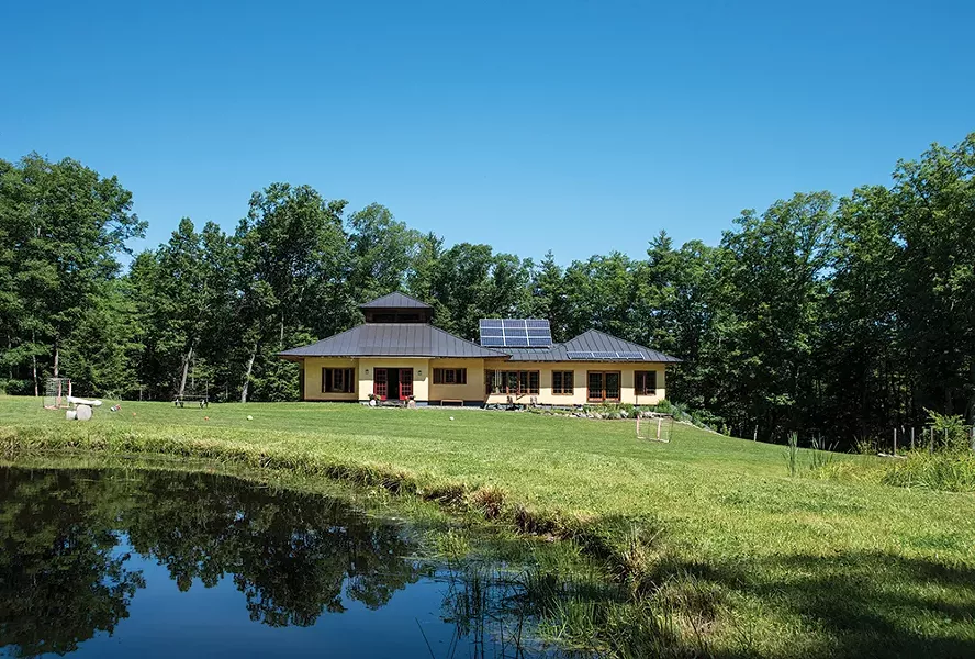Duncan and Masse’s hand-built timber frame home sits on 15 acres and is totally off-grid. Their building methods and lack of electric appliances keep the interior of the home acoustically very quiet, except for the sound of the nearby stream. Outside by the frog pond, it’s a different story. “Because of the clearing and the frogs, we get a lot of hawks and owls,” says Duncan. “They just hang out by the side of the pond, and then eat the frogs—it's certainly pretty lively out there.” - PHOTO: DEBORAH DEGRAFFENREID