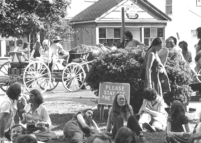 People relaxing on the Village Green. - COURTESY OF THE HISTORICAL SOCIETY OF WOODSTOCK