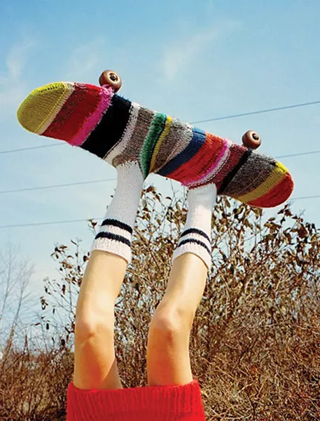 Top half of Aviona Carrigan wearing a skatesock designed by Marist student Erika Rothman and a dress designed by Alexa Wisnieski. - JERRY PENA