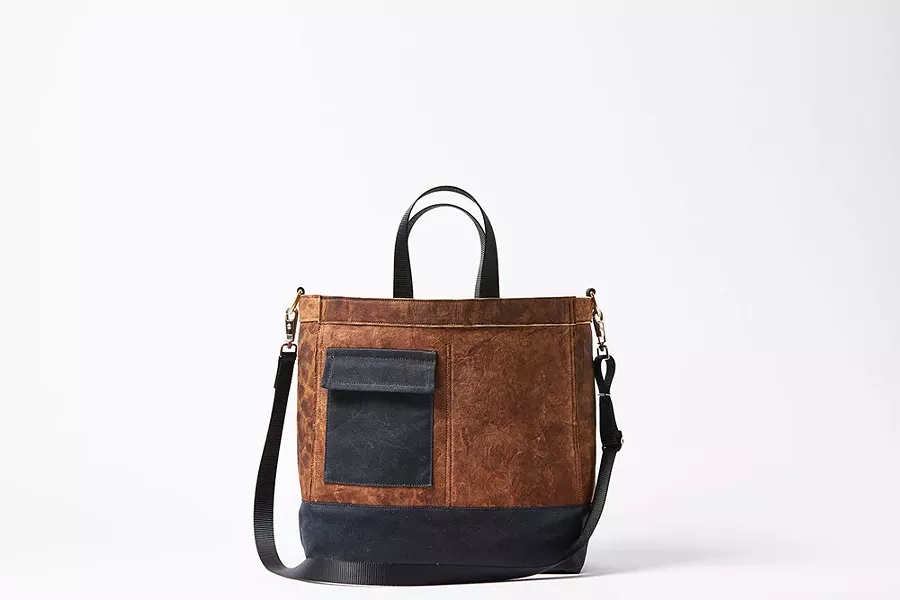 The Mylo Driver Bag uses mycelium leather.