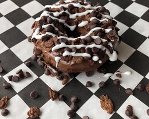 A hazelnut chocolate donut topped with Cocoa Pebbles, chocolate chips & a marshmallow drizzle from Glazed Over in Beacon.