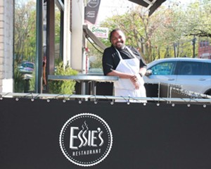 Brandon Walker on the patio at Essie's on Mt. Carmel Place in Poughkeepsie.