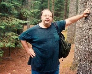 A man not known as an outdoorsman hiking in the Adirondacks, circa 1990.
