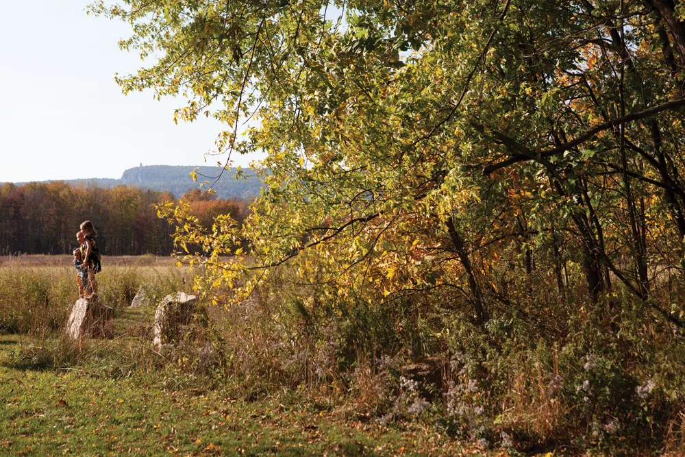 Posing for a photo on the River-to-Ridge Trail, a recreational off-road loop that opened in 2018 and connects downtown New Paltz with the many trails of the Mohonk Preserve. - FIONN REILLY