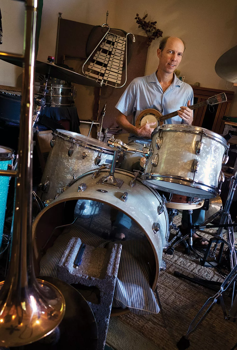 Dean Jones in his No Parking Studio. Citing a lack of minority nominees in their category, the Rosendale children's musician and his band, Dog on Fleas, asked the Recording Academy to remove them from the list of the 2020 Grammy nominees. - PHOTO BY FIONN REILLY