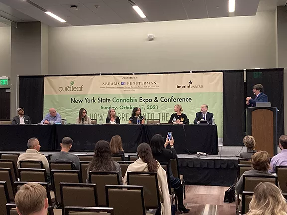 David Holland (right) leading panel discussion during the Cannabis Education Forum. - NOLAN THORNTON