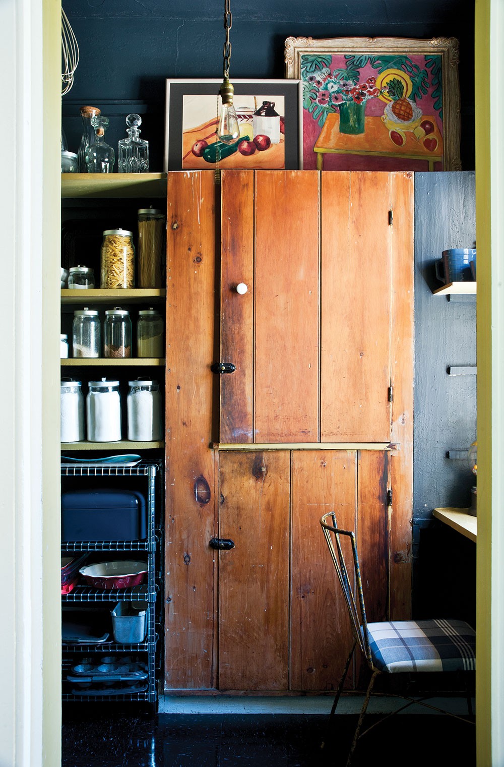 The brown wood cabinet in the pantry is original to this house. - DEBORAH DEGRAFFENREID