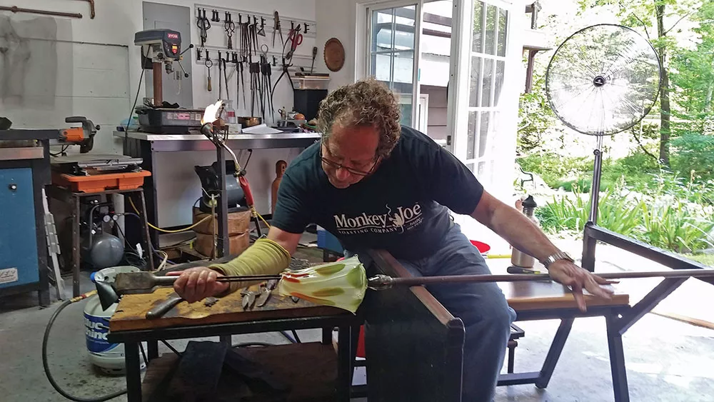 Pablo Weinschenk blowing glass.