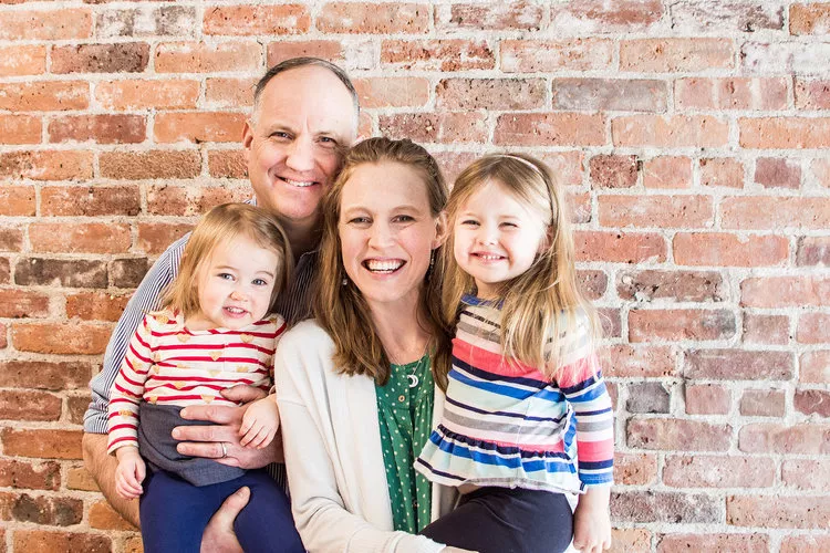 New owners Dallas and Ted Gilpin, with their daughters Beth (1) and Emma (3).