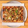 The El Camino features caramelized pineapple, roasted poblano, slow-roasted pork shoulder, Stubbs BBQ sauce, parmesan. The El Camino features caramelized pineapple, roasted poblano, slow-roasted pork shoulder, Stubbs BBQ sauce, parmesan.
