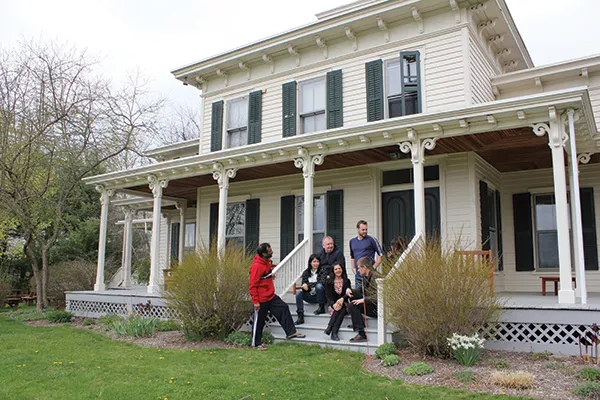 Writers Omi relaxing on the Ledig House Residence Porch, spring 2013.