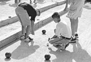 A bocce contestant keeps his eye on the pallino.