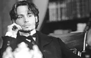 A dapper Johnny Depp, once again punctuating a period piece.