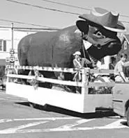 A giant cow with a hat invades the Geauga County - Maple Festival (Thursday).