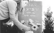 A mourner at the grave of a Black September victim.