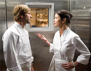 Aaron and Catherine defrost the freezer.
