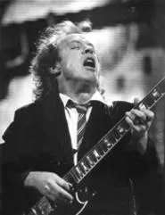 AC/DC's Angus Young sweats to the oldies at Gund - Arena. - WALTER NOVAK