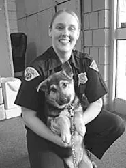 Awww. Jennifer Turner holds a rescued pup. - WALTER NOVAK