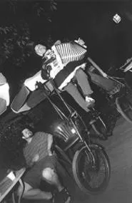 Baby Dee strikes an accordion with the crowd. - WALTER NOVAK