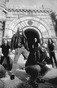 Back in blue: Tim "Ripper" Owens (foreground) - returns with power metallers Iced Earth.