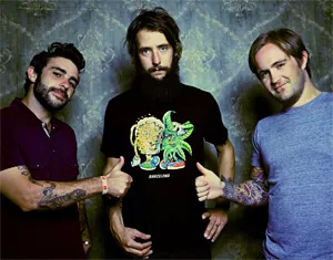 Ben Bridwell's bandmates give thumbs-up to his hippie-like head.