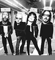 Butch Vig (far right): His battle with hepatitis helped - unite the band at its darkest hour.
