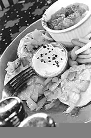 Butter-drenched pierogi with all the fixin's . . . What're - you waiting for? - WALTER NOVAK